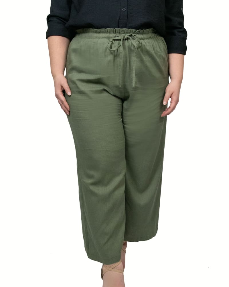Front of a model wearing a size 1X Ambre Paperbag Wide Leg Linen Blend Pants in Green by ANNICK. | dia_product_style_image_id:291405